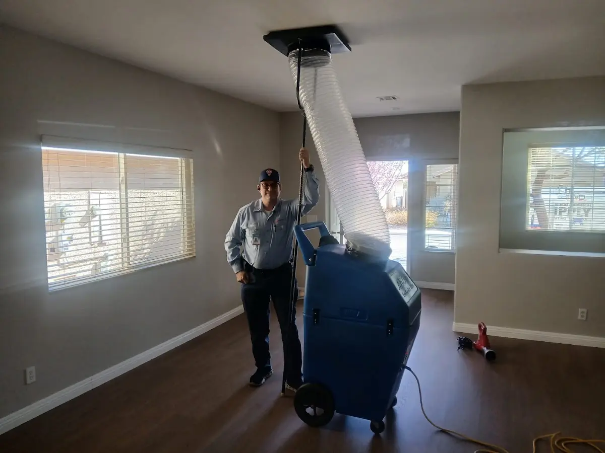 Professional Dryer Vent Cleaning work inside a Watsonville home